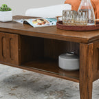 Coffee table vintage farmhouse wood                                         and modern medieval flute with sliding storage door and solid wooden legs